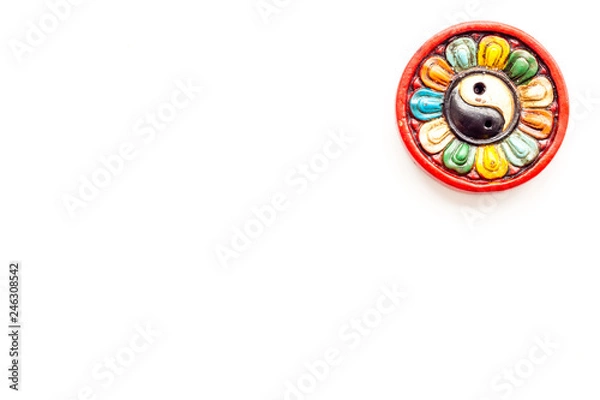 Obraz Buddhist symbol. Yin Yang symbol on white background top view space for text