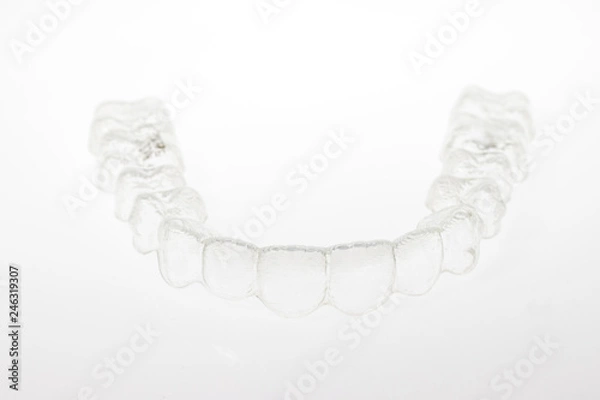 Obraz Invisalign bracces or invisible retainer isolated on white background