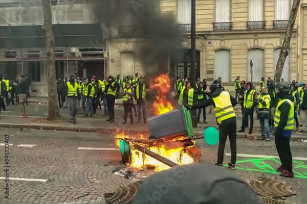 Fototapeta Abstract, blur, bokeh background, defocusing - image for the background. Street riots in Paris, France