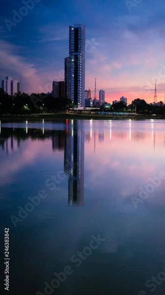 Fototapeta Colorful building reflections on the lake