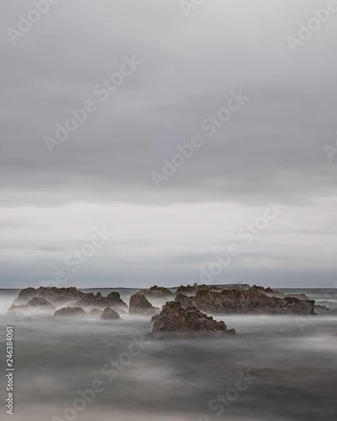 Obraz waves crashing on rocks