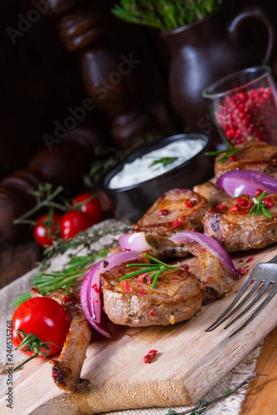 Fototapeta Tasty Lamb chops with mint and rosemary