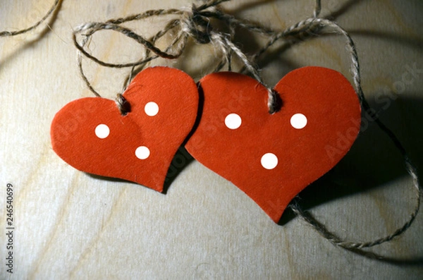 Fototapeta Two hearts on a rope