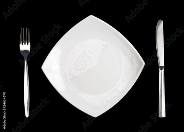 Fototapeta square white plate fork and knife isolated on black background
