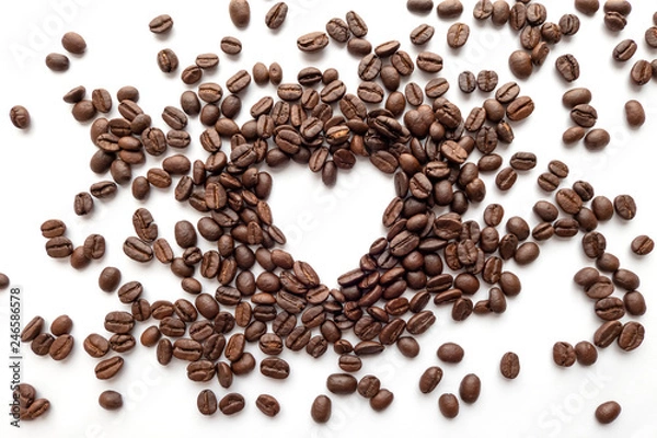 Fototapeta Heart frame of roasted coffee beans with area for copy space.