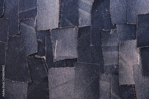 Obraz Torn denims shot layflat.