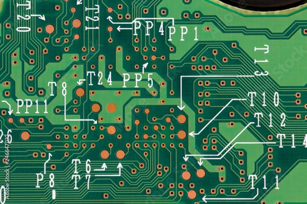Fototapeta Closeup of green printed computer circuit boards. Top view.