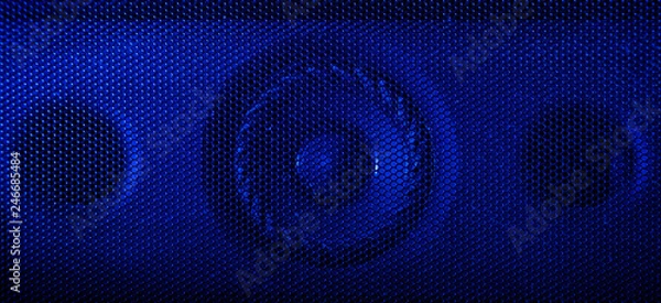 Obraz A close up macro photograph of a audio speaker using a blue flash gel