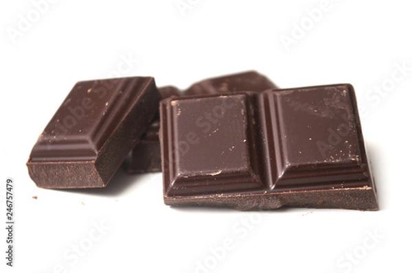 Fototapeta closeup of milk chocolate blocks on white background