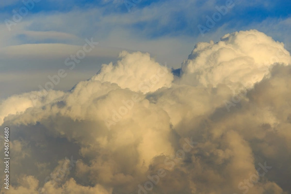 Obraz Clouds after rain before sunset as a background