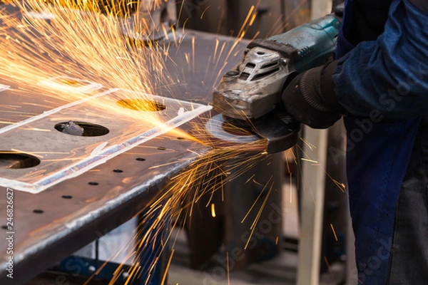 Obraz Surface grinding on steel workpiece