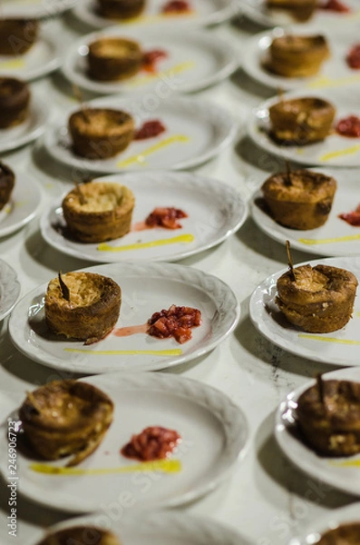 Fototapeta flan with walnut dessert seen from above on a white plate
