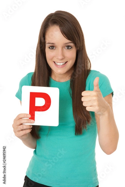 Fototapeta Learner driver holding L plate with thumbs up