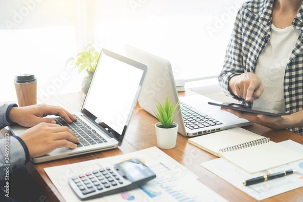 Fototapeta Startup Teamwork Brainstorming Meeting with Graph Planning strategy and financial plan to investment.