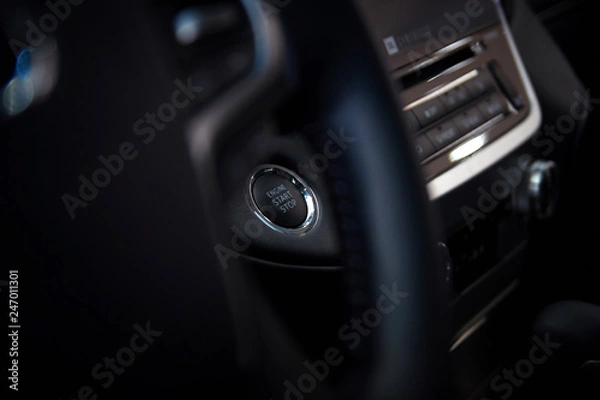 Fototapeta engine start stop button in the car interior
