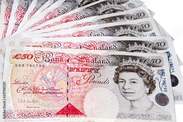 Obraz British pounds isolated on a white background.