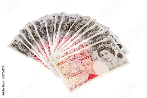 Obraz British pounds isolated on a white background.