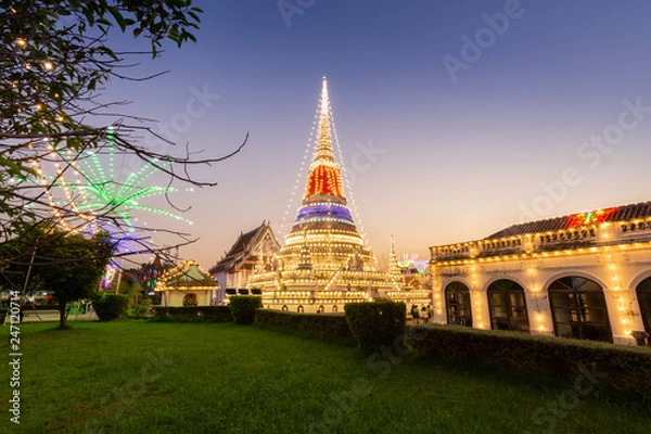 Obraz Stupa at temple phra samut chedi decorated with electric bulbswith and beautiful sky in twilight time, samut Prakan, Thailand. Temple festival.