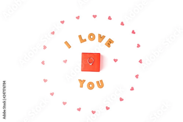 Obraz Valentine's day concept. Declaration of love, frame made of paper hearts. In the center red gift box with ring. Flat lay, top view, white background, isolated, copy space
