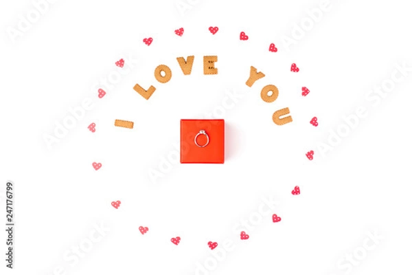 Obraz Valentine's day concept. Declaration of love, frame made of paper hearts. In the center red gift box with ring. Flat lay, top view, white background, isolated, copy space