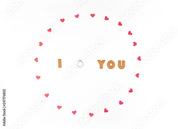 Obraz Valentine's day concept. Declaration of love, frame made of paper hearts. In the center engagement ring. Flat lay, top view, white background, isolated, copy space