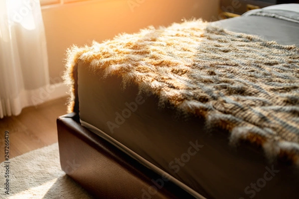 Fototapeta Synthetic carpet on the laminate in the home interior. Close-up