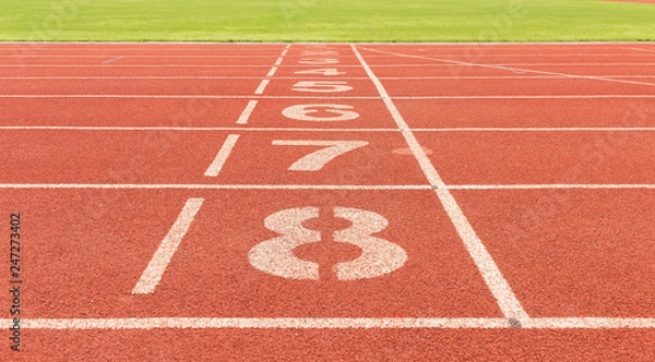 Fototapeta The white track number on Synthetic Rubber Treadmill, Start point of run competition go to finish