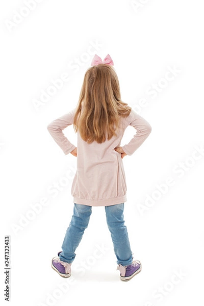 Obraz Back view of little girl looking at wall. Rear view. Isolated on white background 