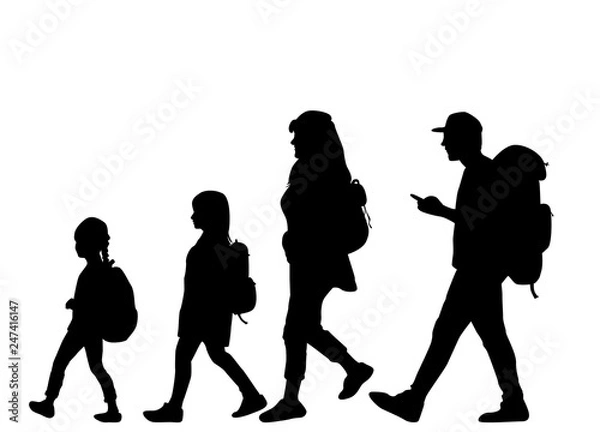 Fototapeta Silhouette family on a walk.