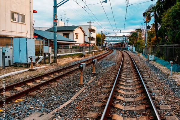 Fototapeta Train tracks in one of the stations of  Japan