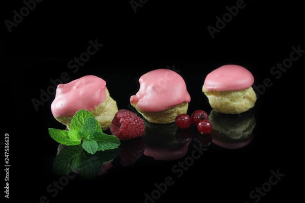 Fototapeta perfect profiteroles with pink glaze
