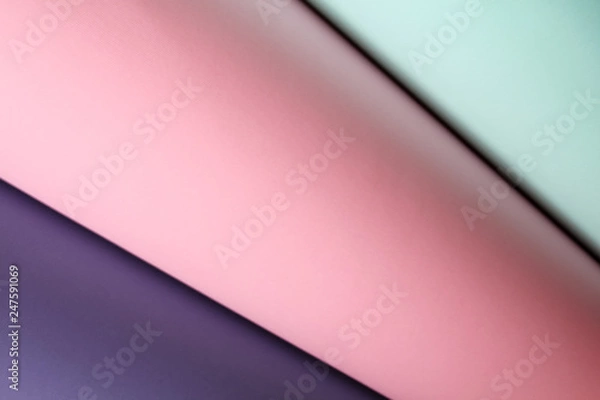 Fototapeta Abstract asymmetric volumetric paper background in pastel colors. Geometric paper background in soft pastel pink, blue and purple colors.