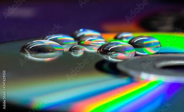 Fototapeta abstract background of water drops on CD disk