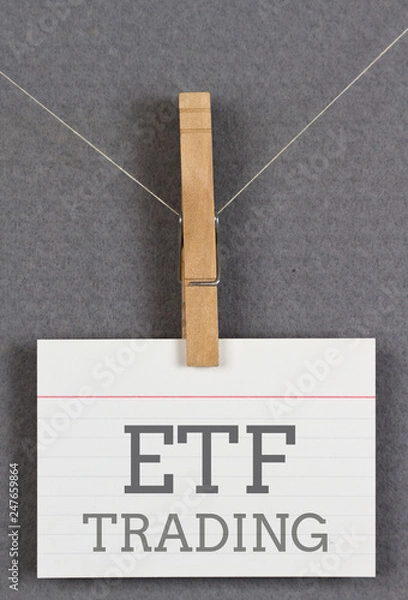 Obraz ETF trading written on an index card moored to a clothespin