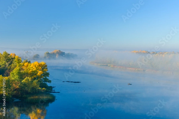 Fototapeta Fog over the water on a river Dnieper on autumn