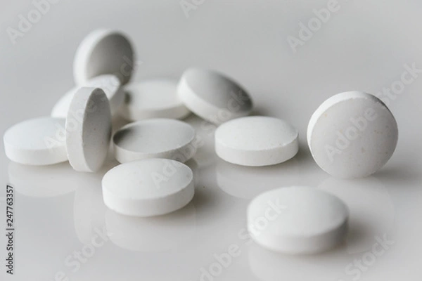 Obraz white pills close up
