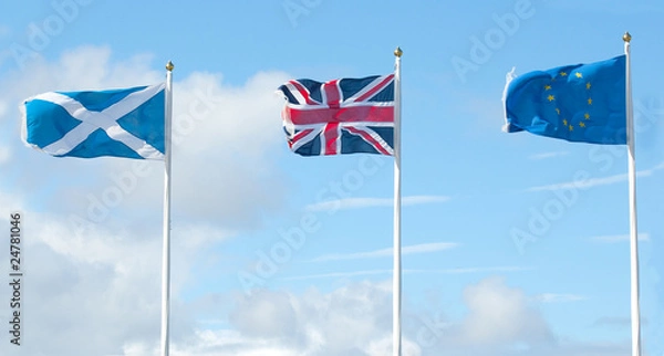 Fototapeta scottish, british and european flags in wind