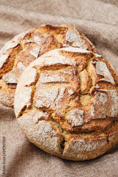 Fototapeta Brown Bread Rustic Linen Background Top Down View