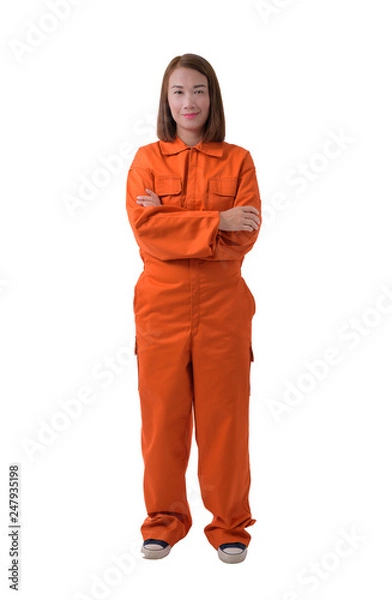 Fototapeta Full body portrait of a woman worker in Mechanic Jumpsuit isolated on white background