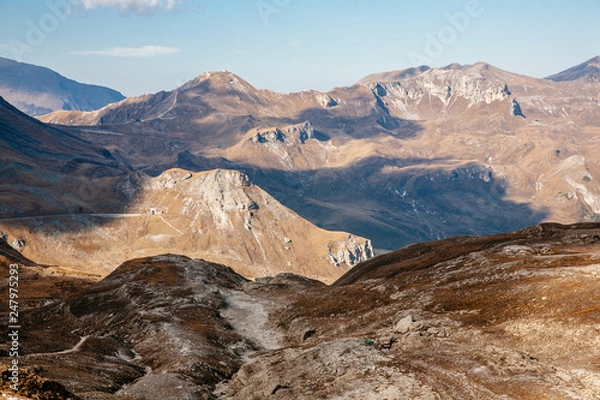 Fototapeta View of mountain with blue sky from Grossglockner High Alpine Road in Austria