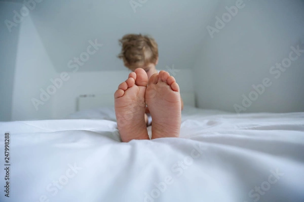 Obraz Five years old child sleeping with hat comfortably