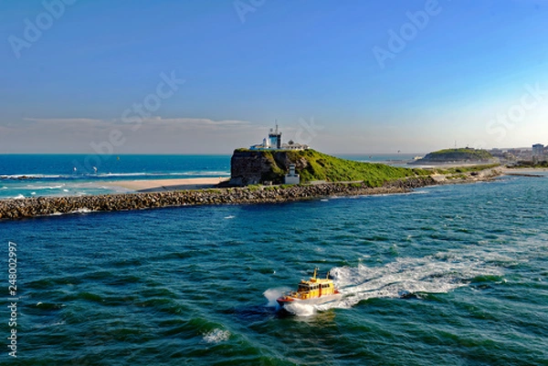 Fototapeta Sea departure in a setting sun from Newcastle, New South Wales, Australia