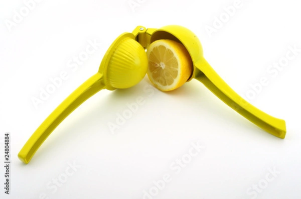 Fototapeta lemon in lemon squeezer