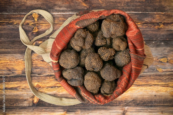 Obraz Truffles on the wooden table.