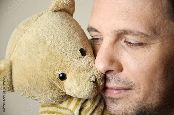 Obraz man with teddy bear
