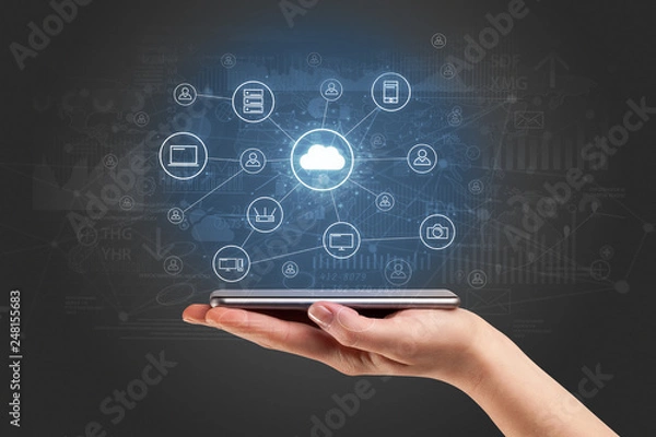 Fototapeta Businessman working on phone with reports and graphs concept around
