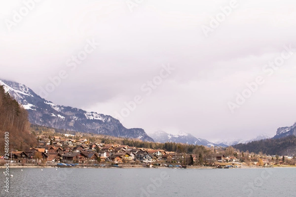 Fototapeta City on the banks of Lake Brynz in the Alps