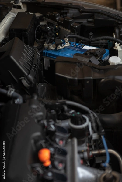 Obraz A Close up detail of modern car engine seeing all main parts.