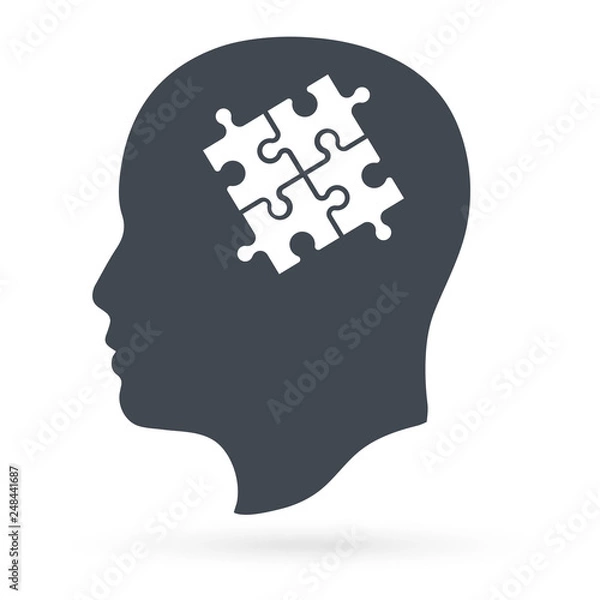 Fototapeta Head of Puzzles. Puzzle Piece Silhouette Head. details came together, a puzzle has formed in a head