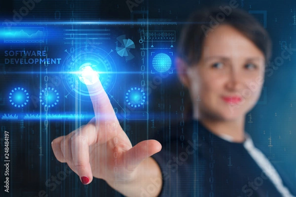 Fototapeta The concept of business, technology, the Internet and the network. A young entrepreneur working on a virtual screen of the future and sees the inscription: Software development